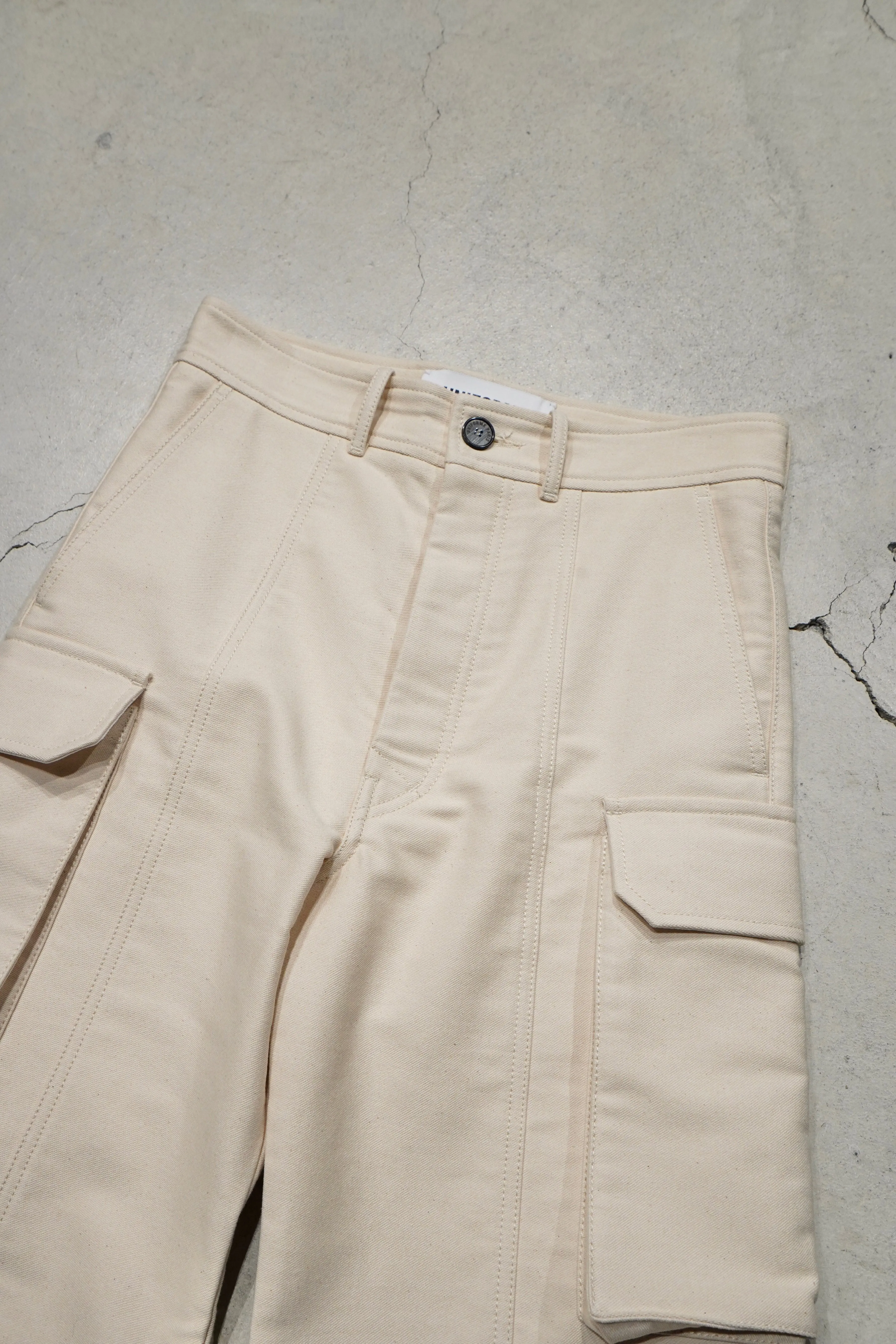 UNIFORME STITCH-DETAIL FLAP-POCKET TROUSERS