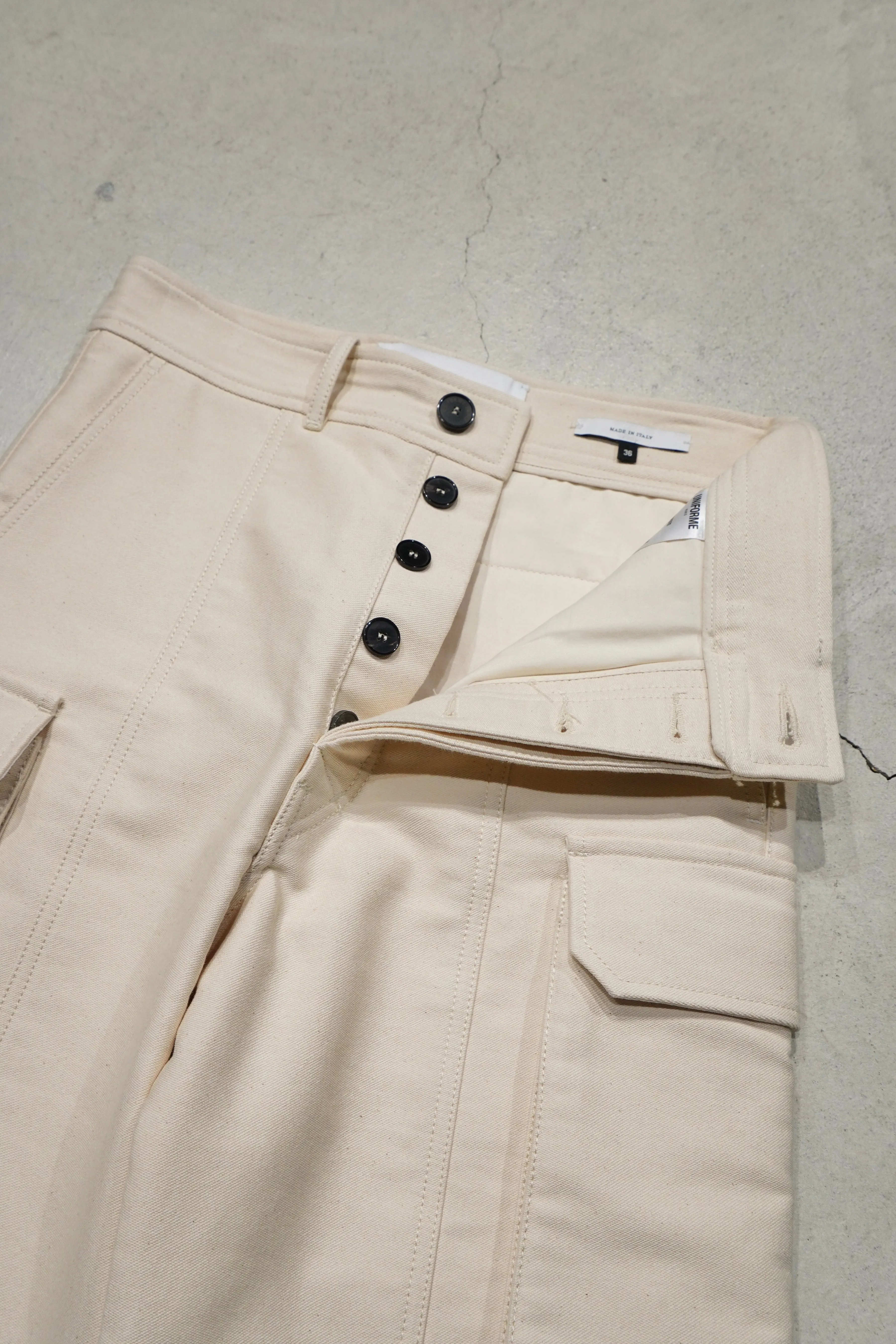 UNIFORME STITCH-DETAIL FLAP-POCKET TROUSERS