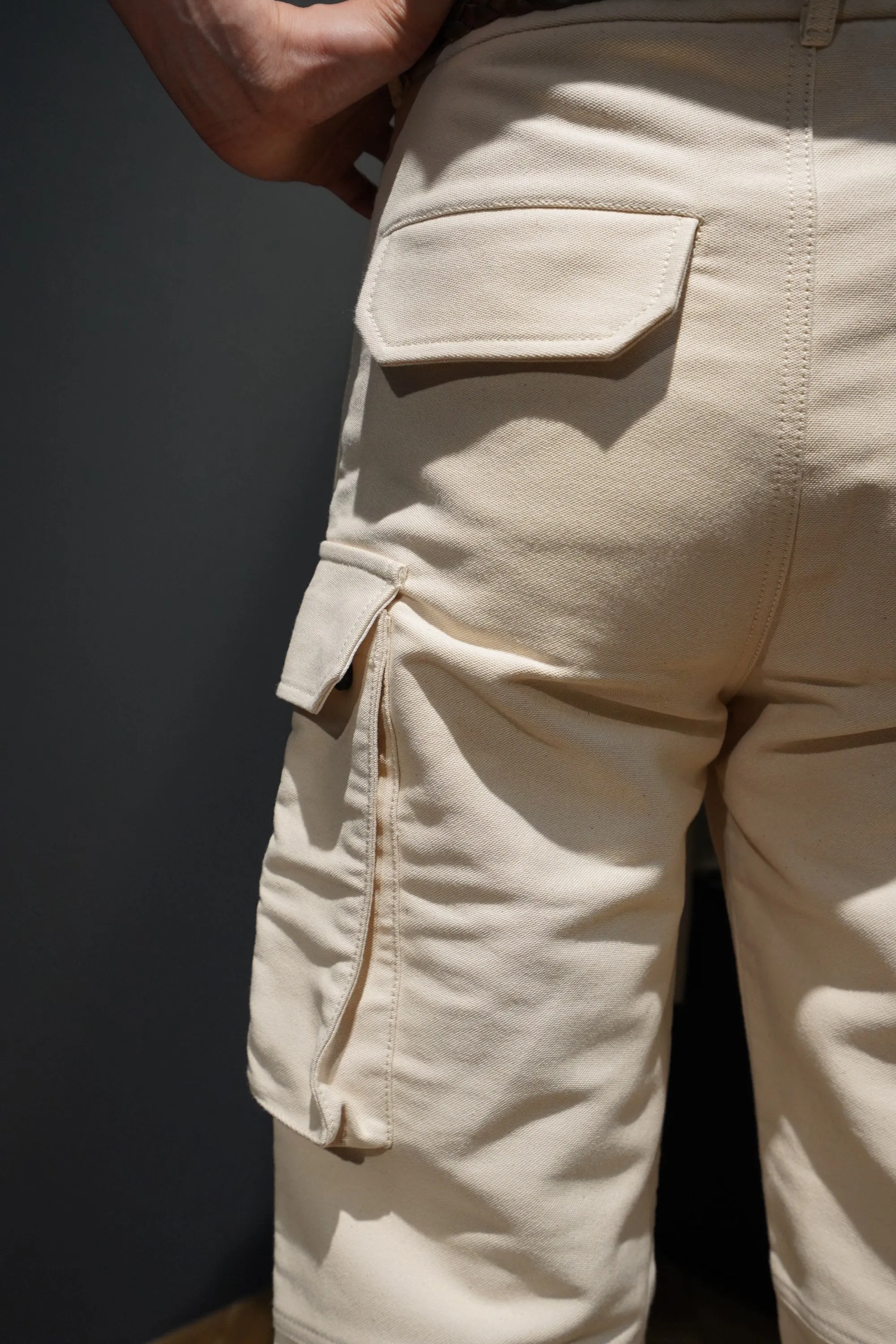 UNIFORME STITCH-DETAIL FLAP-POCKET TROUSERS