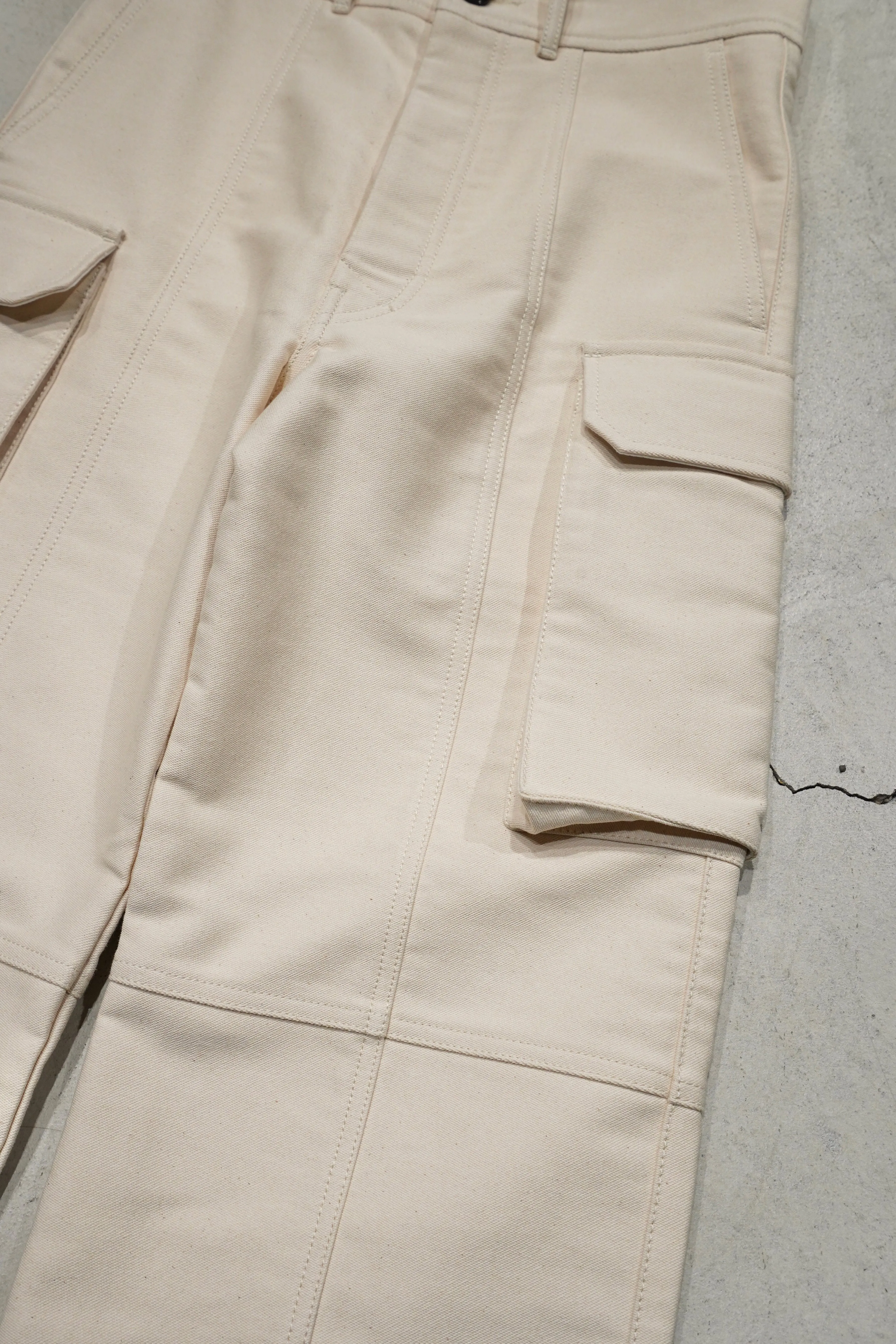 UNIFORME STITCH-DETAIL FLAP-POCKET TROUSERS